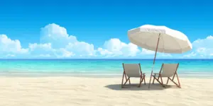 2 chairs with umbrella on beach